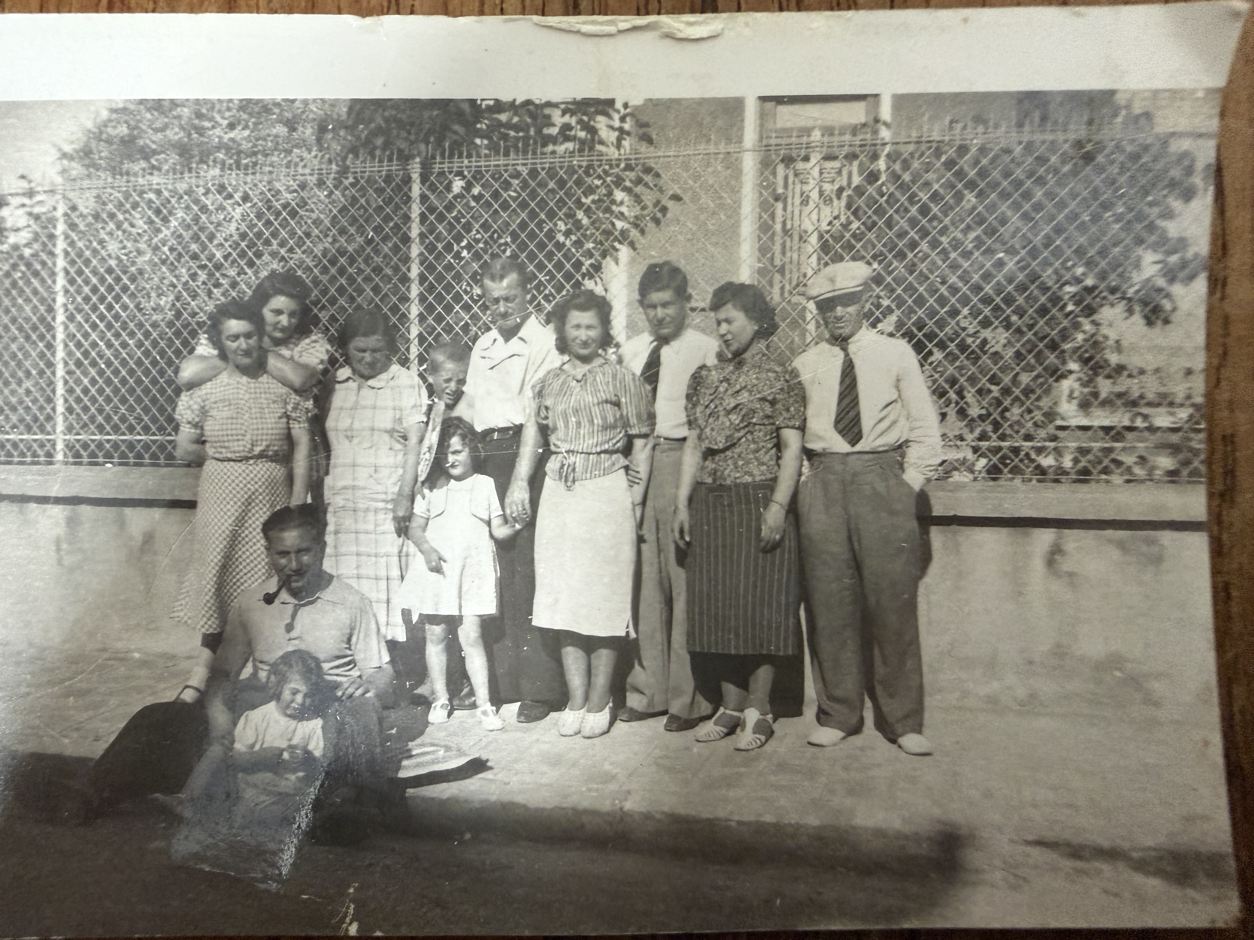 Hanna with family and friends; her mother Miriam in the white skirt