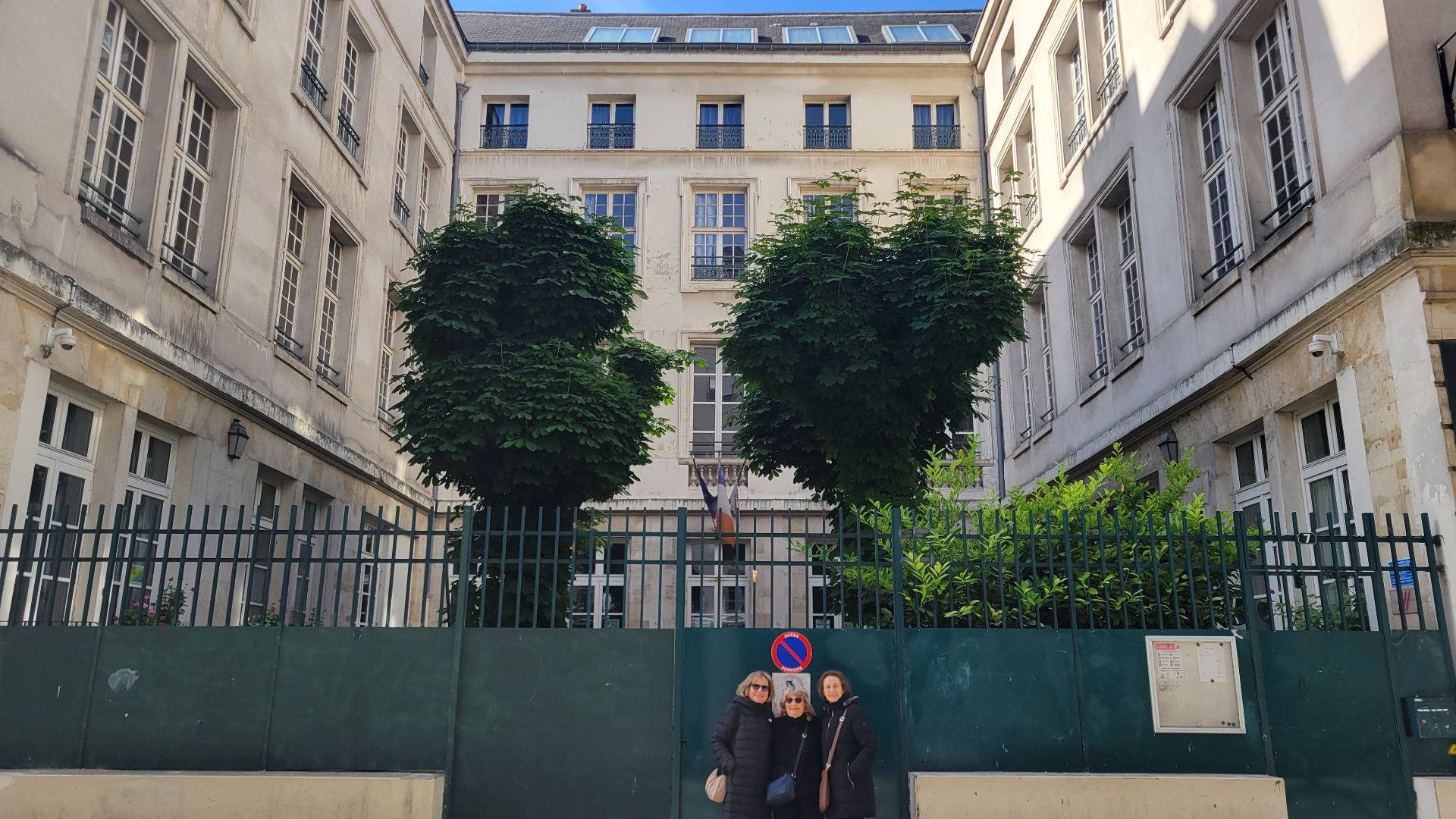 Hanna and family at her childhood building