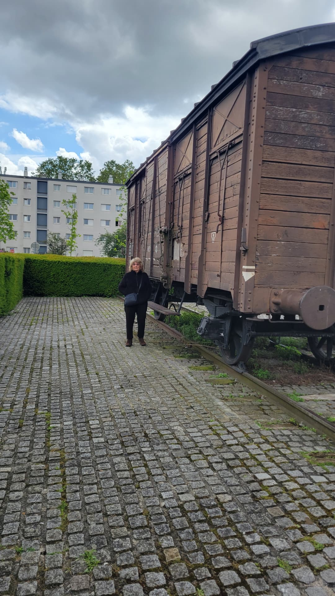 Hanna beside a cattle car at Drancy